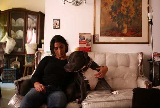 Kanielle Hernandez, of Manhattan, has refused to give up Denim, a 60-pound pit bull, and says he is well behaved.